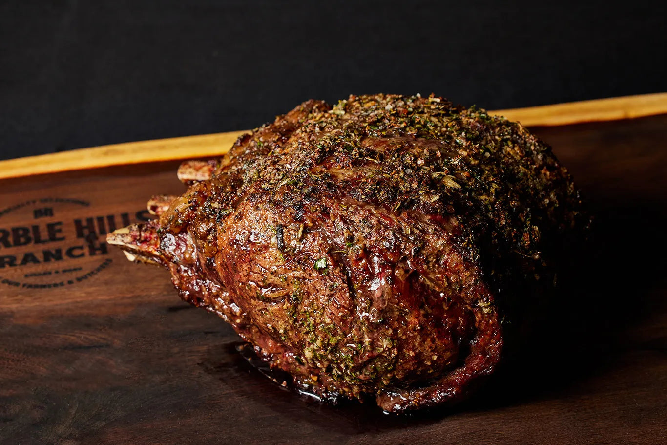 A 3-bone in prime rib roast from Marble Hills Ranch, featuring an appetizing appearance.